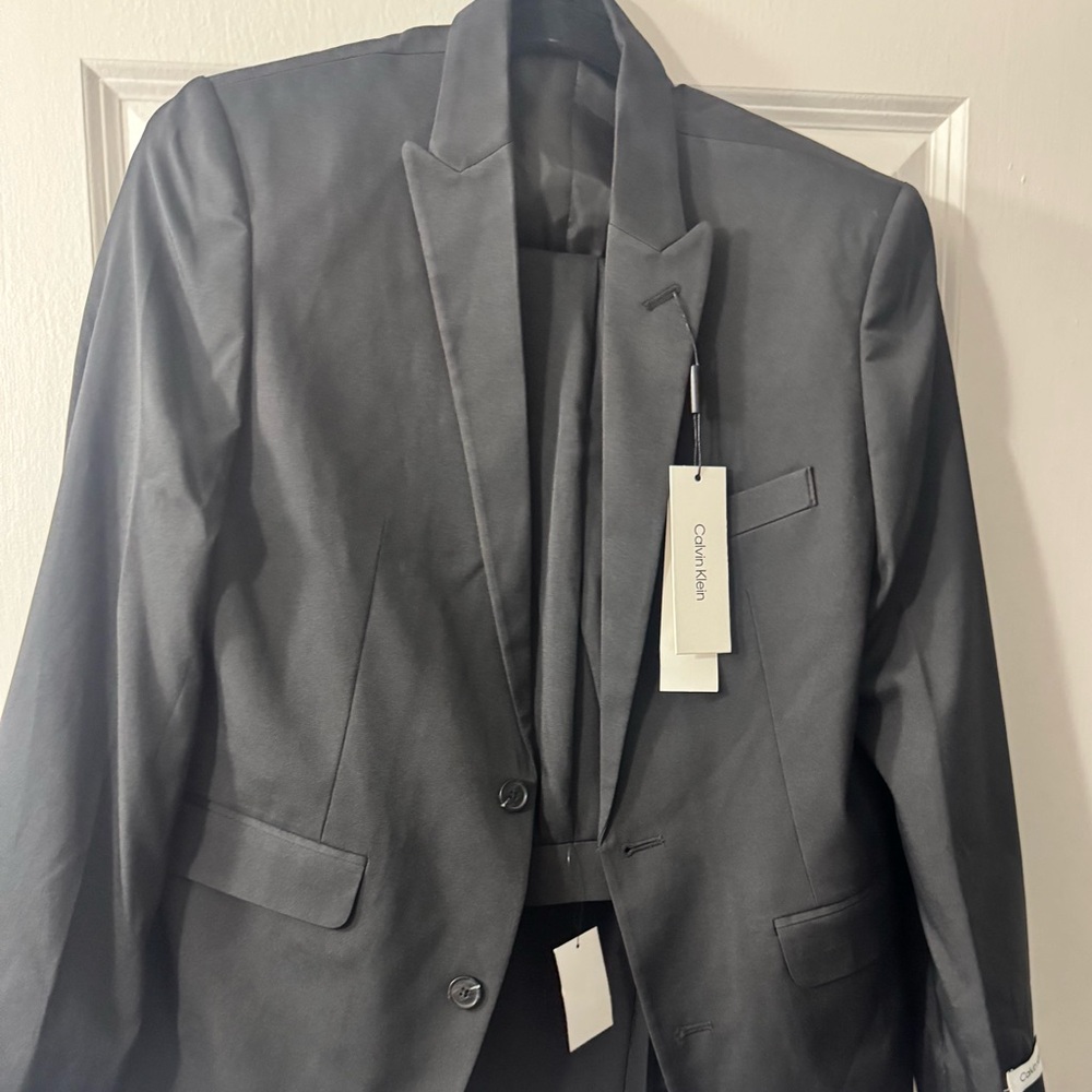 Calvin clean suits 
Slim fit Husky